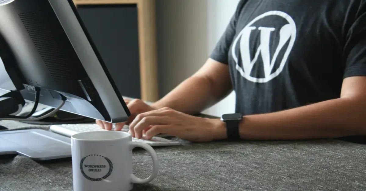 person in black and white t shirt using computer 19 scaled copy 1200x628 1 14